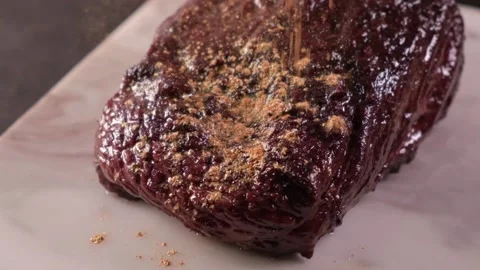 A closeup view. Sprinkle with gold steak. Super slow motion Stock Footage 172022735