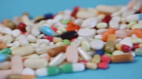 Closeup view of stack of medical pills and capsules Stock Footage 97053683