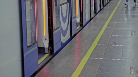 Closeup view of subway car opening its doors and people going inside in Moscow Stock Footage 157942783