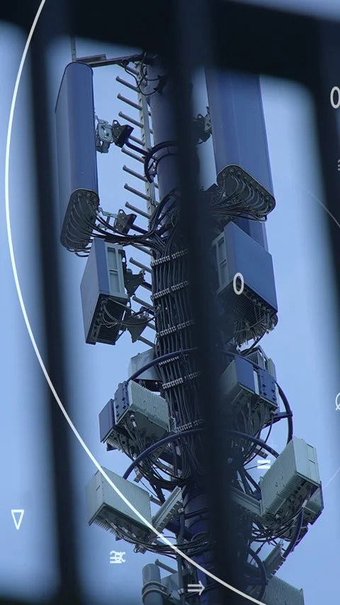 Closeup view of a Telecom Tower equipped with multiple Antennas for Stock Footage 295866277