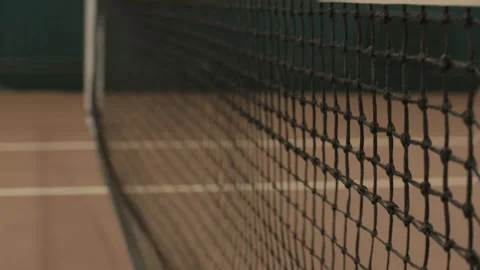 CloseUp View of a Tennis Net Positioned on the Court, Capturing the Essence of Stock Footage 285605535