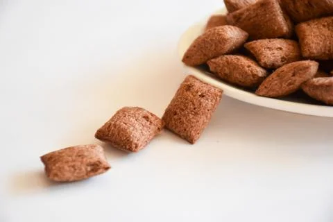 Closeup view of three crispy brown Cereal pillows Stock Photos