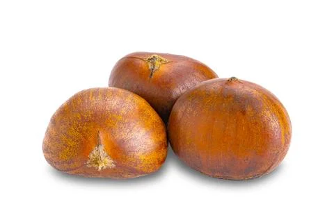 Closeup view of three roasted chestnutd isolated on white background. Stock Photos