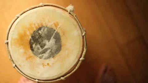 Closeup view of the top of modern hand bongo drum percussion music instrument 스톡 동영상 95424662