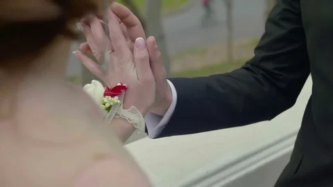 Closeup view of touching hands of newlyweds Stock Footage 70337058