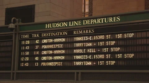 Closeup view of train departure board in New York City Stock Footage 65056144
