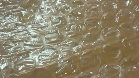 Closeup view of transparent bubble wrap texture with intricate light reflec.. Stock Footage 340053162