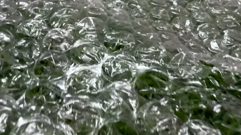 Closeup view of transparent bubble wrap showcasing intricate textures and l.. Stock Footage 340221366