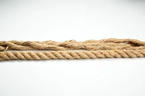 Closeup view of two straight ropes string isolated over a white background Foto stock