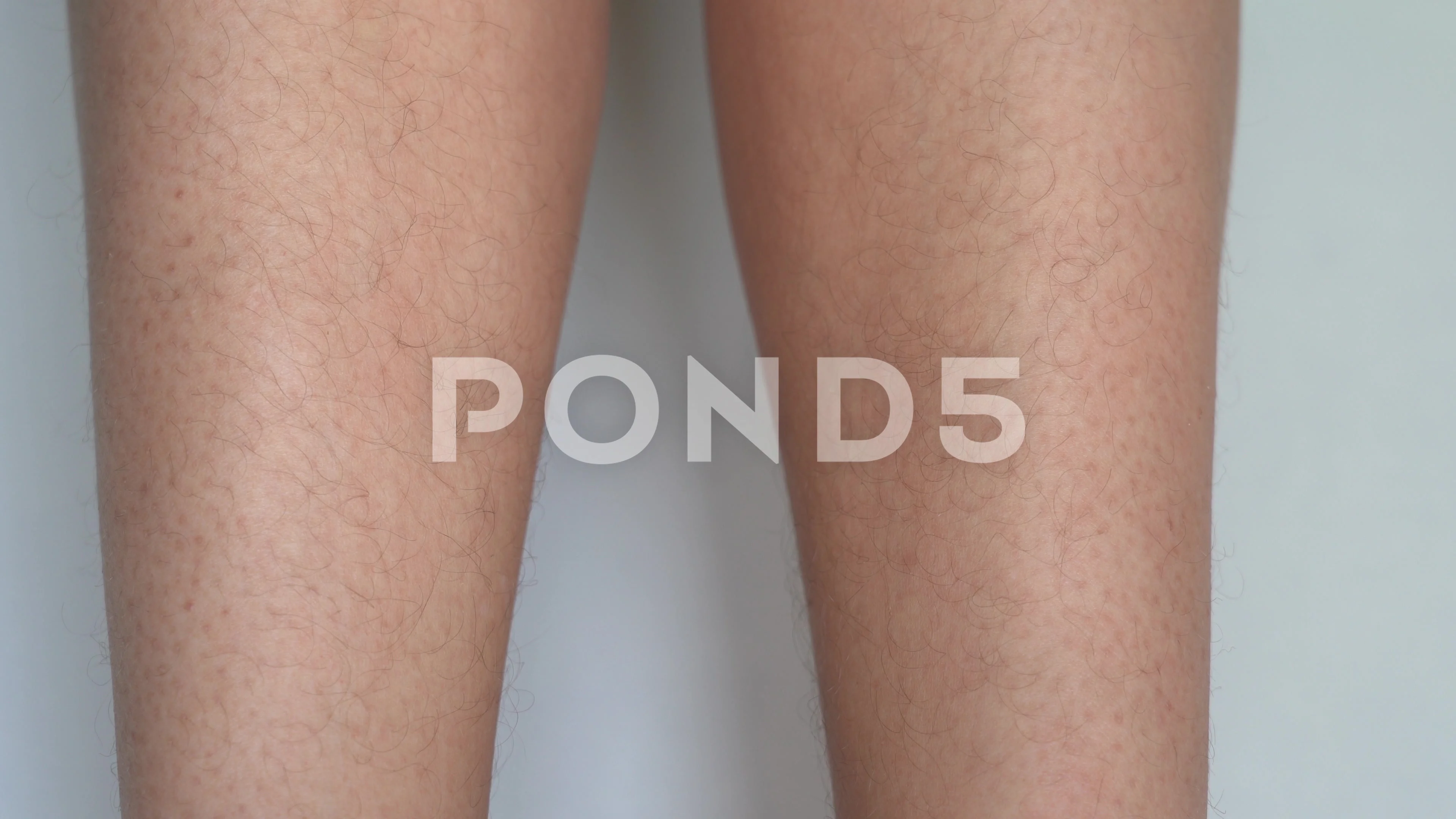 Closeup view of two white female legs an, Stock Video