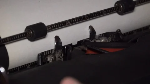 Closeup view of typing text typewriter and carriage return mans hands russian Видео 129401788