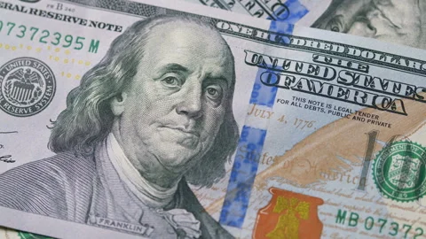 A closeup view of the Unique U.S. Currency featuring the iconic portrait of Benj Stock Footage 303556221