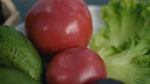 Closeup view of vegetables on the plate. Concept of healthy nutrition and Stock Footage 133346339