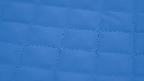 Closeup view video of blue quilted texture of fabric. Stock Footage 129170458