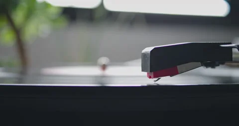 Closeup view of vintage headshell of portable record player strart playing on Video stock 131302128