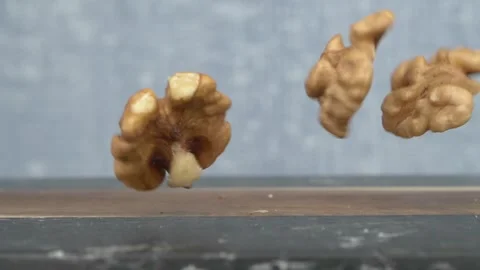 A CloseUp View of Walnut Shells Perfectly Arranged on a Beautiful Natural Video stock 288318646