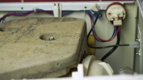 Closeup view of washing laundry machine excessive drum vibration internals Video stock 153932073