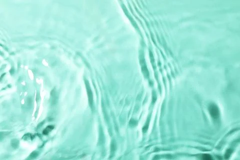 Closeup view of water with rippled surface on light blue background Foto stock