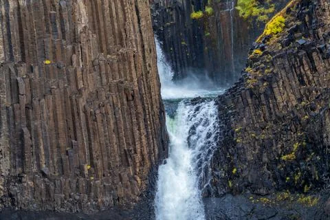 Closeup view of waterfall and basaltic rocks Stock Photos