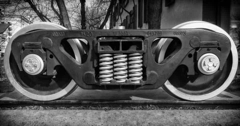 A closeup view of the wheels of a train Stock Photos