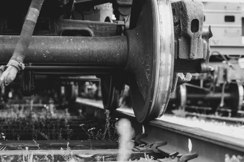 A closeup view of the wheels of a train Stock Photos