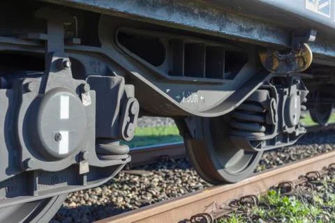 A closeup view of the wheels of a train Stock Photos