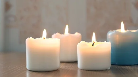 Closeup view of white burning candles on the table rustic style candle burns 스톡 동영상 105078846