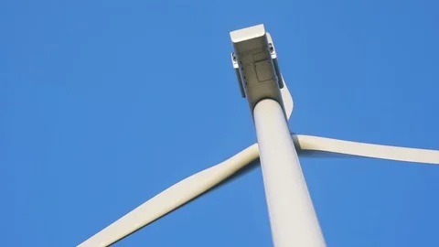 Closeup view of windmill blade rotating white propeller details of modern wind Stock Footage 91348178