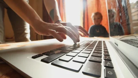Closeup view of woman hands using laptop keyboard indoors with playing little 스톡 동영상 98562698