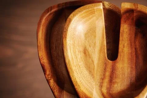 Closeup view of wooden tableware with a blurred background Stock Photos