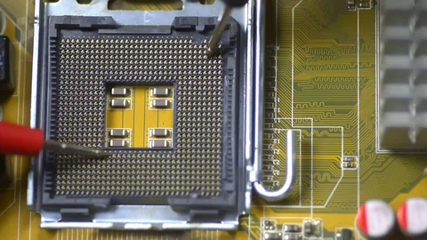 Closeup view of working process and repairing CPU of complex electronic device Stock Footage 129508921