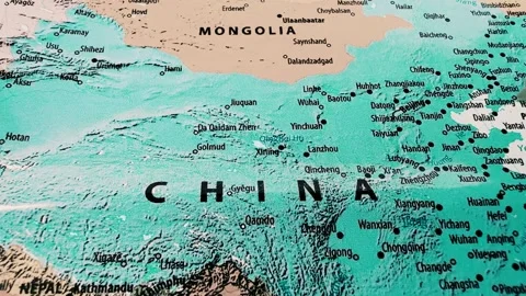 Closeup view of a world map with a teal color filter Stock Footage 341914995