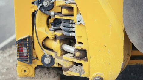 A CloseUp View of Yellow Roller Machinery Components Showcasing Intricate Stock Footage 312633588