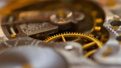 Closeup for a vintage  mechanical clockwork Stock Photos