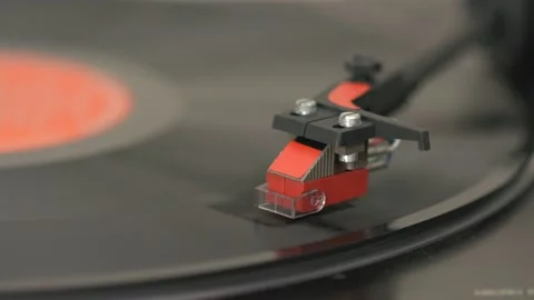 Closeup of vintage record player while playing a vinyl record. Realtime video Stock Footage 169292708