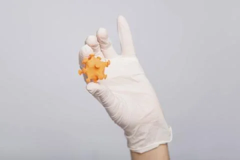Closeup virus mock up in doctor's hands, concept of scientific research Stock Photos