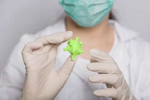 Closeup virus mock up in doctor's hands, concept of scientific research Stock Photos