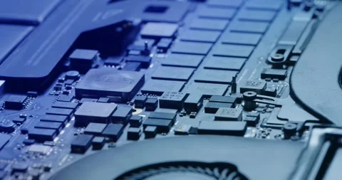 CloseUp Visual of Various Computer Hardware Components and Intricate Circuitry Stock Footage 293955743