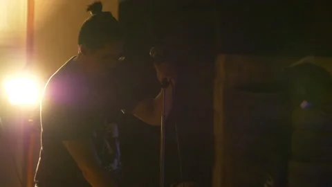 Closeup of a Vocalist Setting up the Microphone Before a Performance Stock Footage 219963789