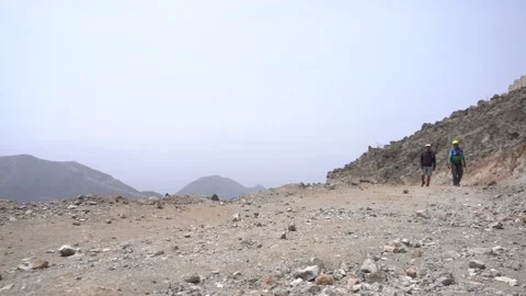 Closeup walking towards the camera hiking two friends  Stock Footage 145151017