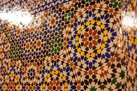 Closeup of a wall with a colorful Arabic pattern Stock Photos