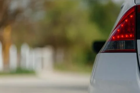 Closeup warning car light. back side of a white car. Stock Photos