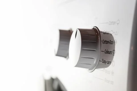 Closeup of washing machine control panel dials and buttons Stock Photos