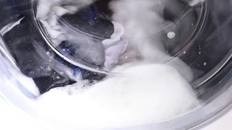 Closeup of washing machine washes clothes. Stock Footage 72642519