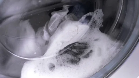 Closeup of washing machine washes clothes. Stock Footage 72642666