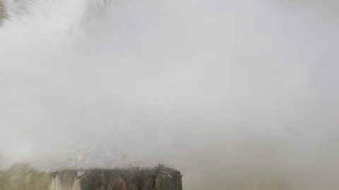 Closeup of water bottle exploding from shotgun blast. Stock Footage 113027673