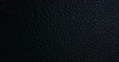 Closeup of water droplets streaming down dewy cup Stock Footage 105575732