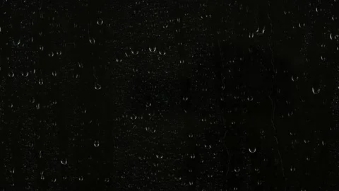 Closeup water rainfall, rain drops falling on window glass over black background Видео 171604337