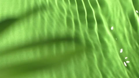 Closeup water surface texture splash, ripples isolated on chroma key background Stock Footage 196674215