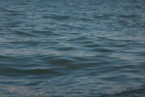 Closeup of a water waves background Stockfoto's
